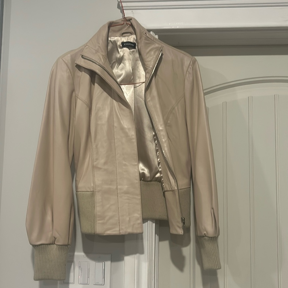 Approximately size small creamy beige leather Bebe jacket